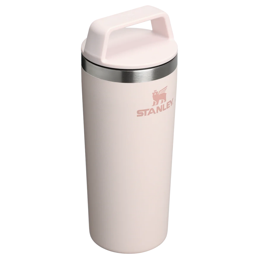 Stanley 1913 México light pink stainless steel travel mug with a two-piece lid and integrated handle.