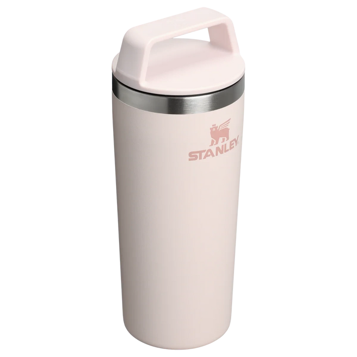 Stanley 1913 México light pink stainless steel travel mug with a two-piece lid and integrated handle.