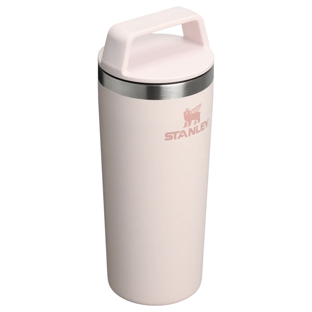 Stanley 1913 México light pink stainless steel travel mug with a two-piece lid and integrated handle.
