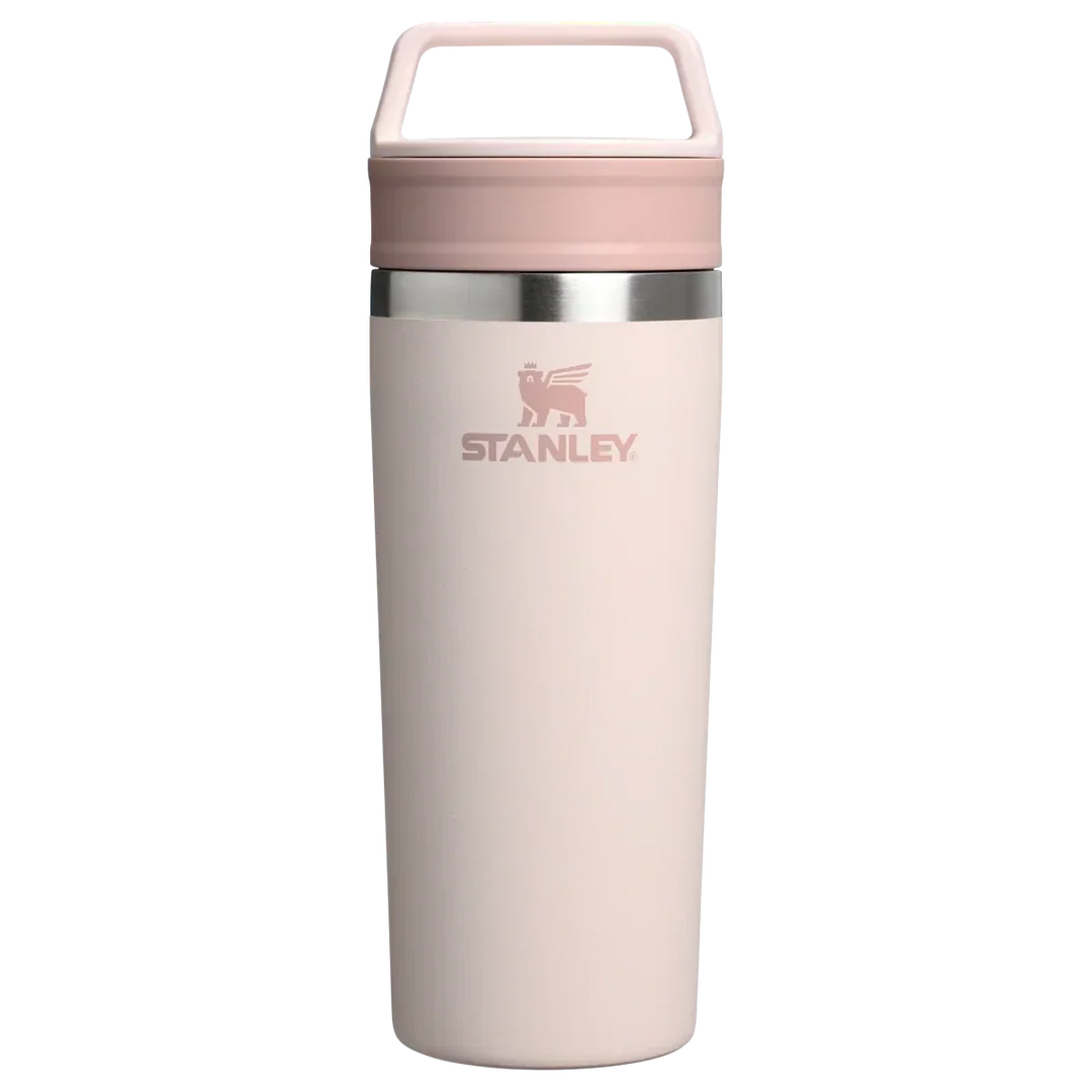 Stanley 1913 México light pink stainless steel travel mug with a two-part lid and integrated handle. 473ml capacity.