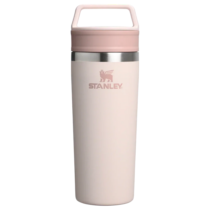 Stanley 1913 México light pink stainless steel travel mug with a two-part lid and integrated handle. 473ml capacity.