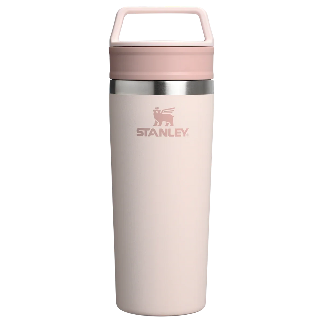 Stanley 1913 México light pink stainless steel travel mug with a two-part lid and integrated handle. 473ml capacity.