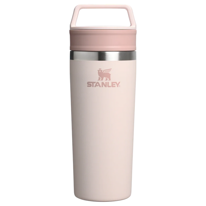 Stanley 1913 México light pink stainless steel travel mug with a two-part lid and integrated handle. 473ml capacity.
