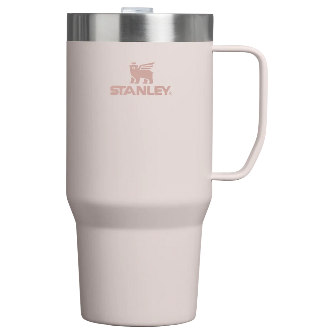 Stanley 1913 México light pink 709ML stainless steel travel mug with handle and lid. Double-wall vacuum insulation keeps drinks hot or cold.
