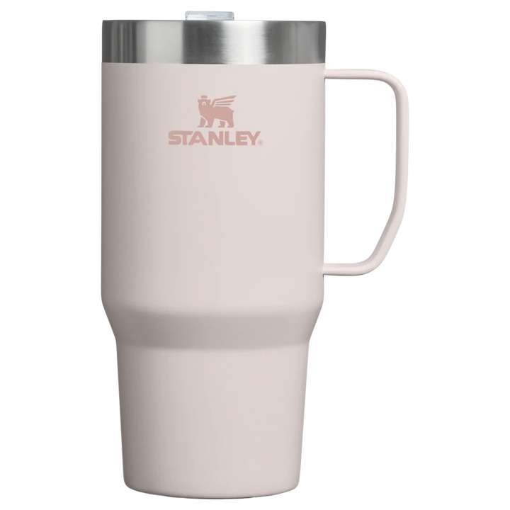 Stanley 1913 México light pink 709ML stainless steel travel mug with handle and lid. Double-wall vacuum insulation keeps drinks hot or cold.